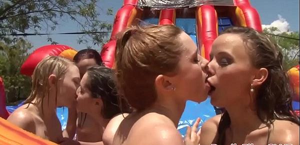  Lesbian beauties sharing dildos outdoors